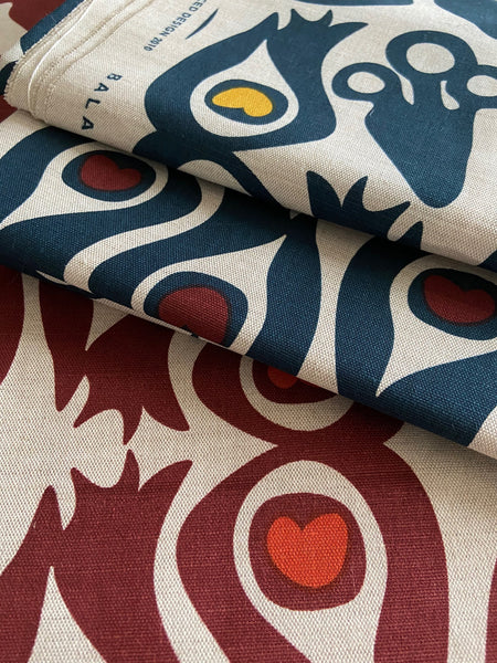 PEACOCK WINE/ORANGE on natural SWATCH